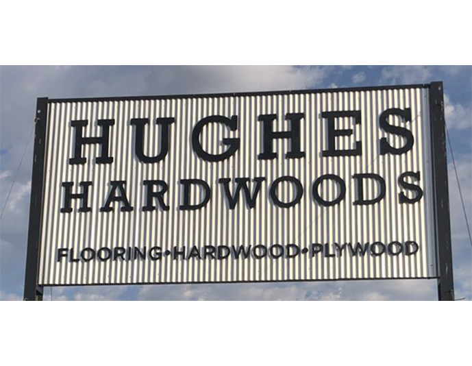 storefront sign for Hughes Hardwoods in CA